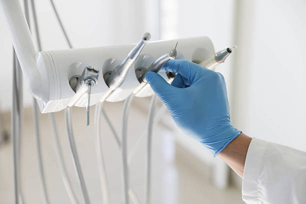 Professional Tooth Extraction technician working in North Laurel, MD